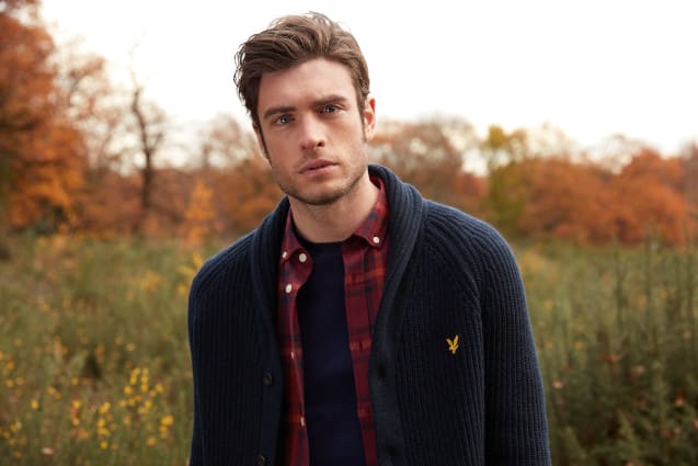 Man Layering A Check Shirt With A Cardigan