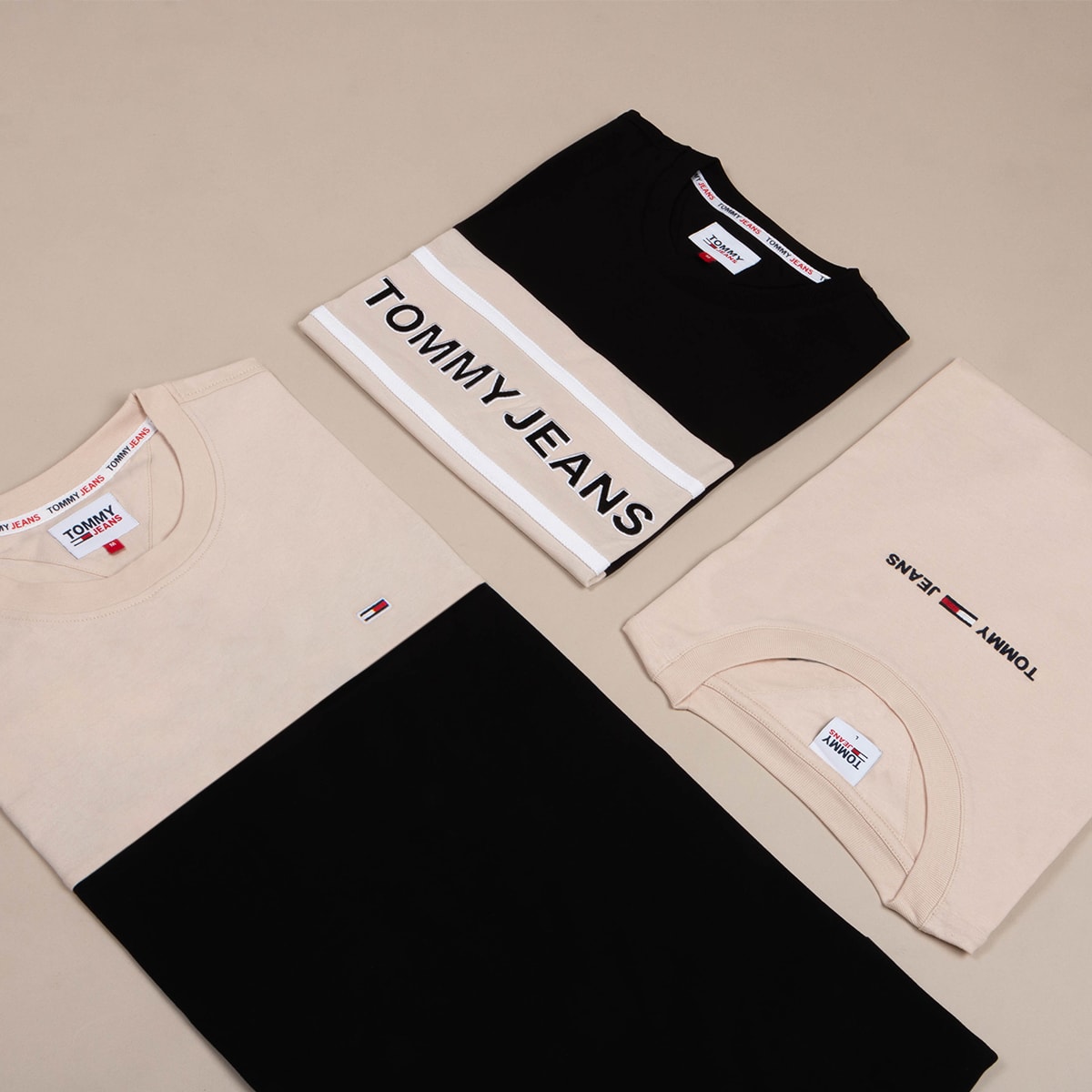 A colour palette coordinated capsule outfit folded neatly and laid out