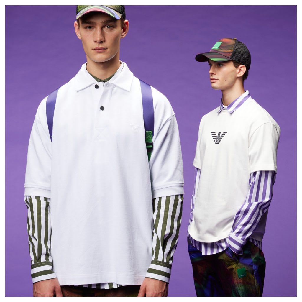 Two guys dressed in Emporio Armani against a purple background