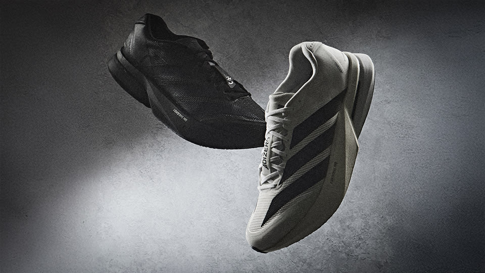 Two sporty trainers from different pairs