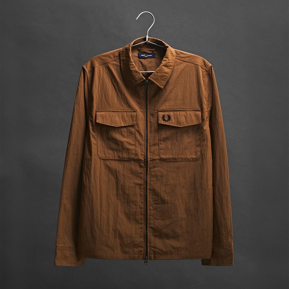 A brown Fred Perry jacket