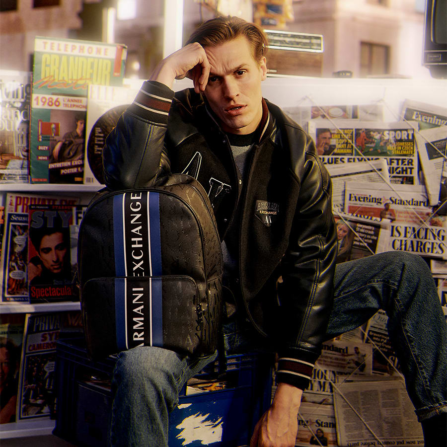A man dressed in Smart Casual Armani Exchange clothing