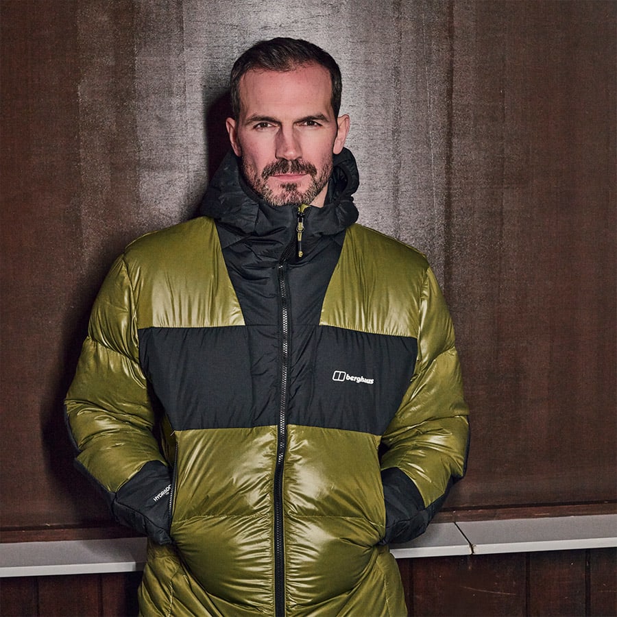 A man wearing a waterproof Berghaus jacket
