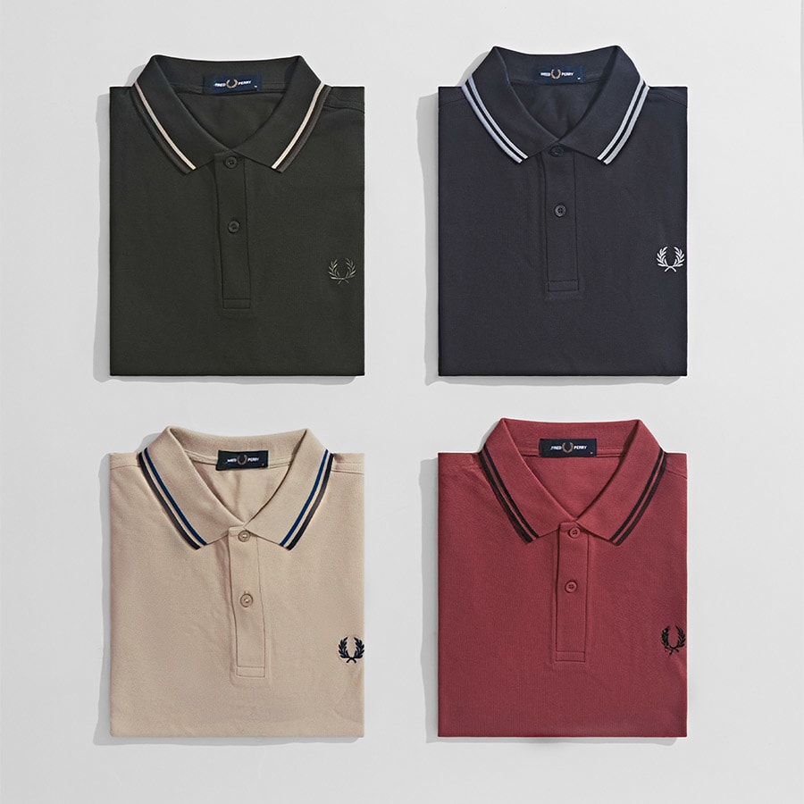 Four Fred Perry Polo Shirts