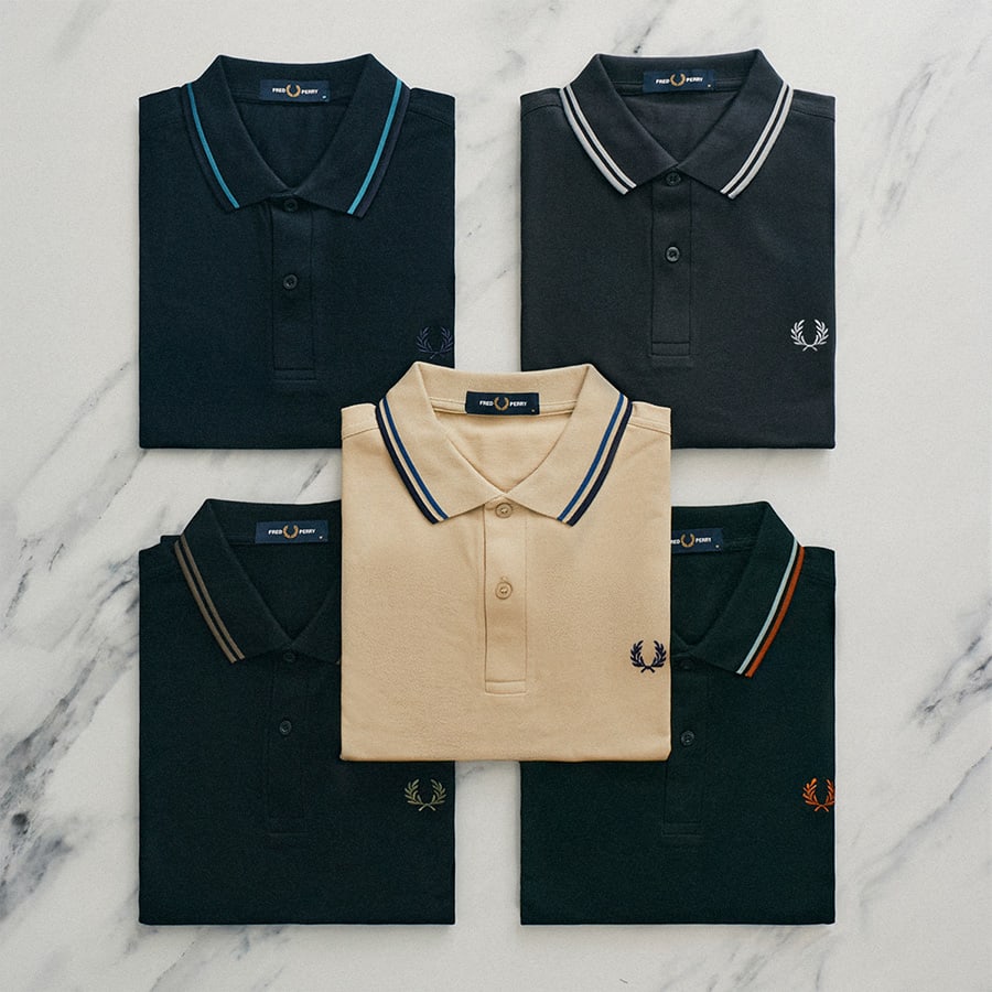 Five Fred Perry polo shirts