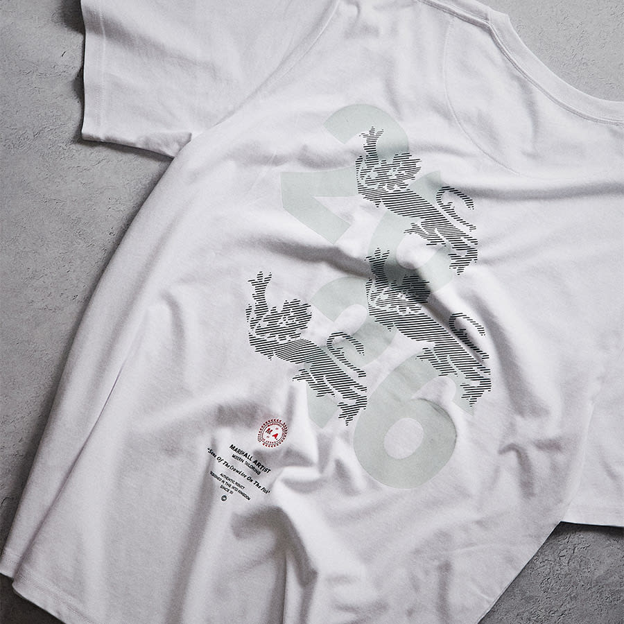 A white T-shirt with a three lions motif