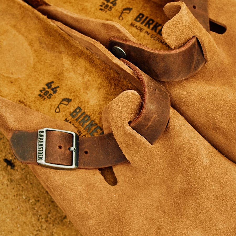 A pair of Birkenstocks on the beach