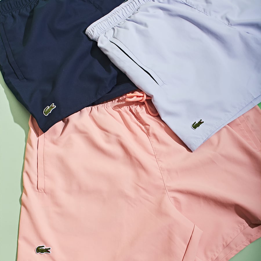 Lacoste swim shorts in various colours