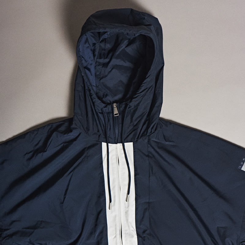 A navy lightweight jacket
