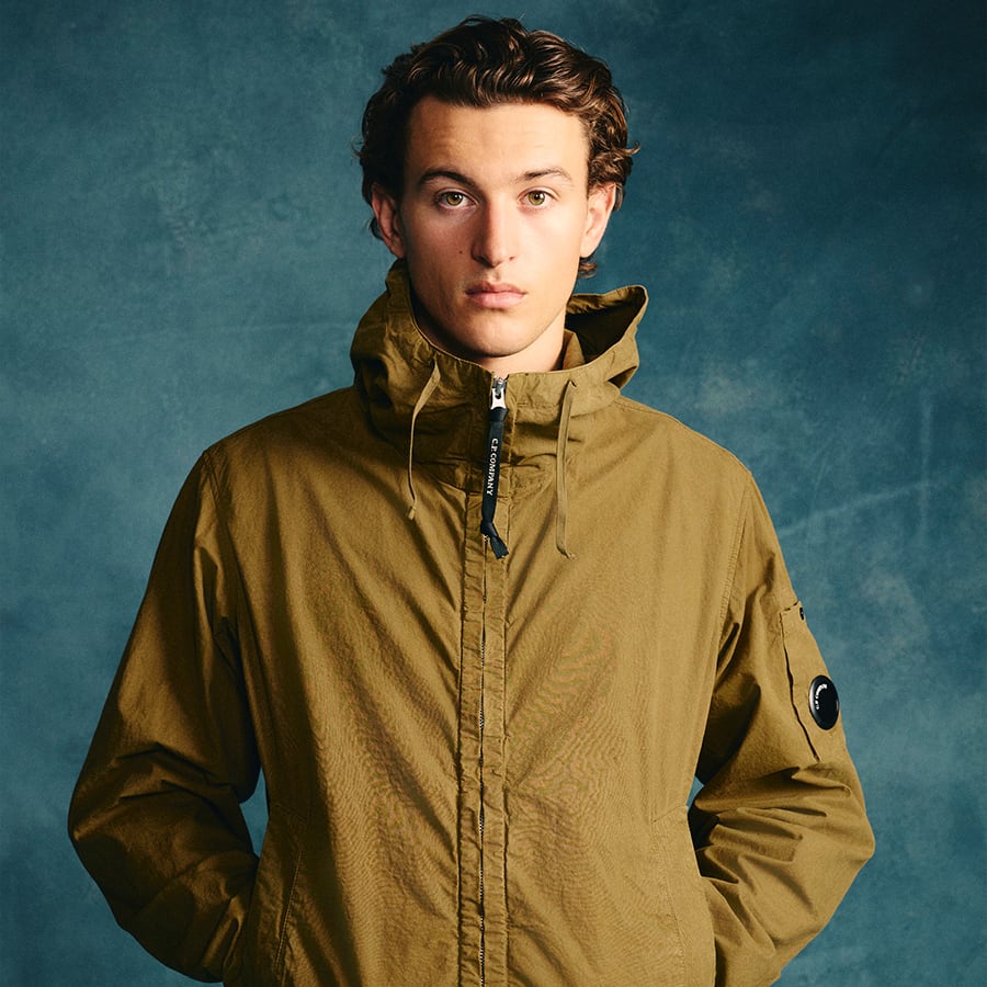 A man wearing a CP Company jacket