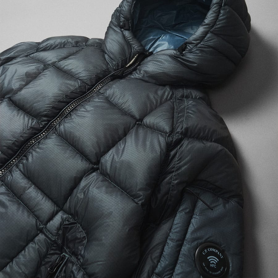 A black CP Company puffer jacket