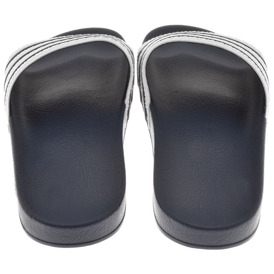 Adidas originals adilette store sliders in white navy