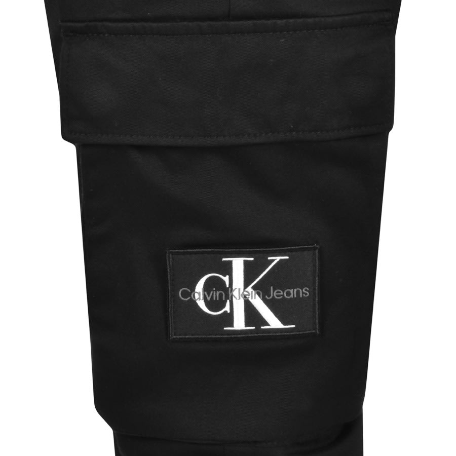 Calvin Klein Jeans zipped loose cargo trousers in black | ASOS