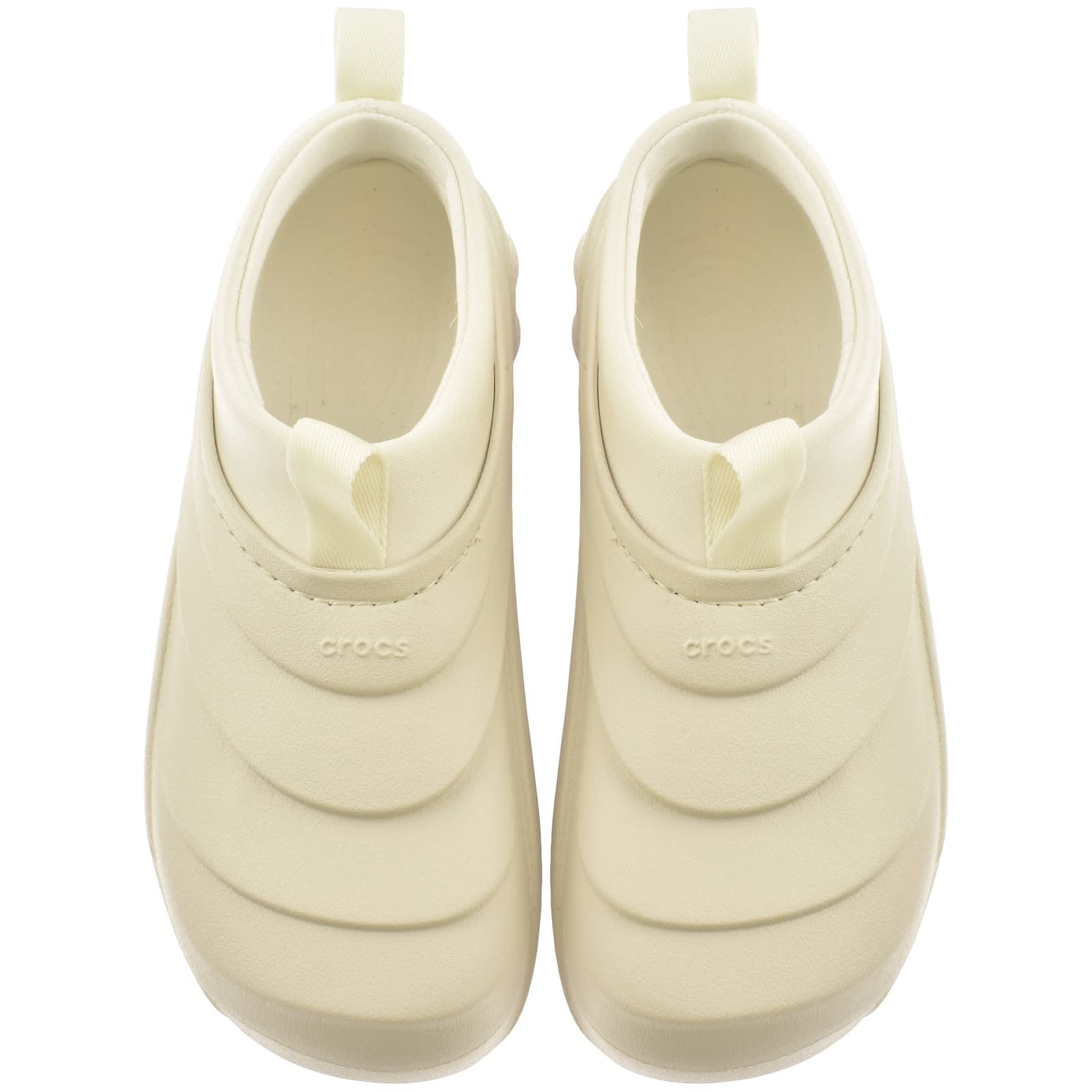 Cream crocs online