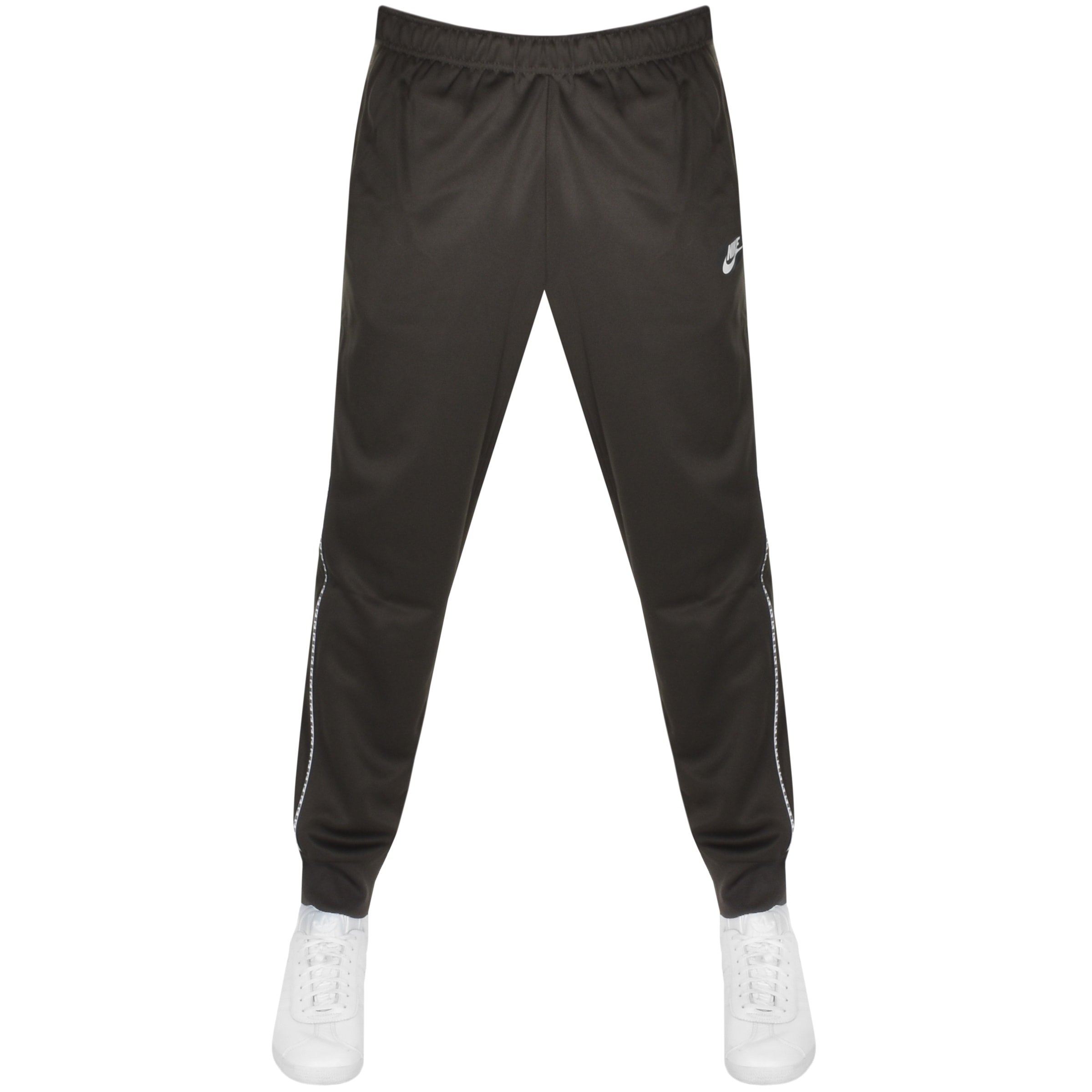 grey nike joggers with black stripe