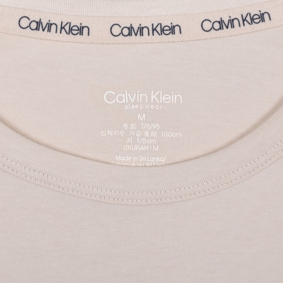 Beige calvin klein t shirt 2025